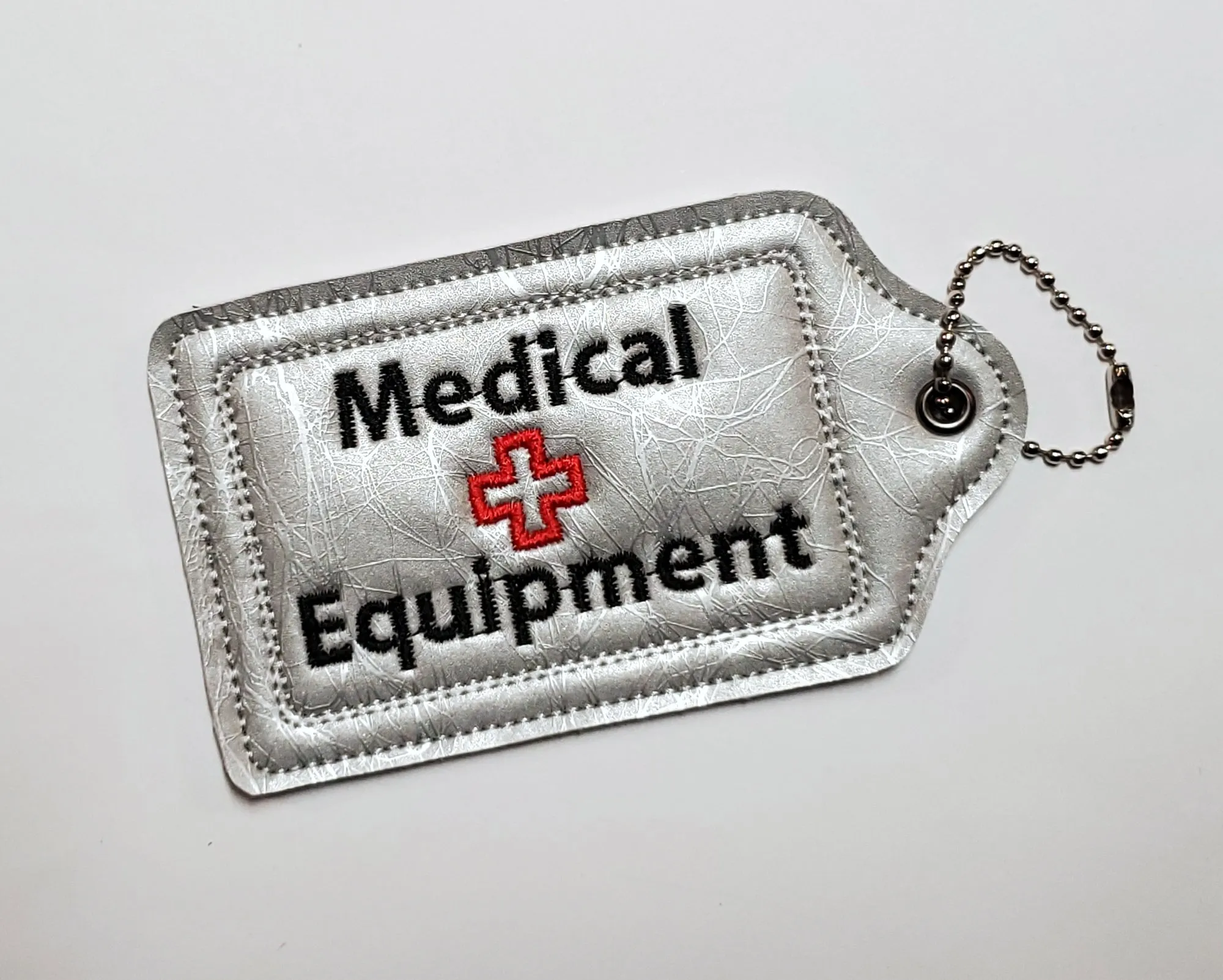 Silver Medical Equipment Luggage Tag with your choice of prints